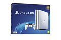 White PlayStation 4 Pro 1TB games console with controller