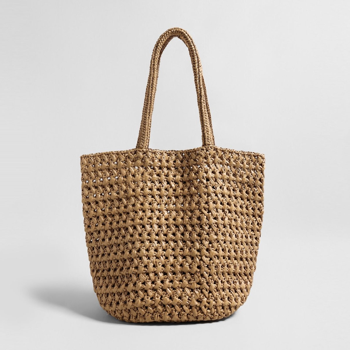 Natural handwoven raffia basket tote